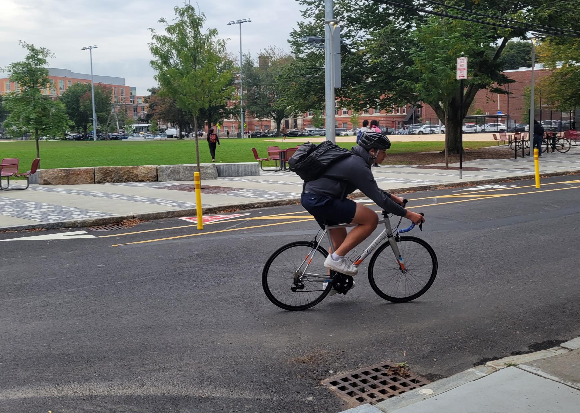 Sophomore Luke Humblias biking to school on the morning of September 29, 2023, on Greenough Street.