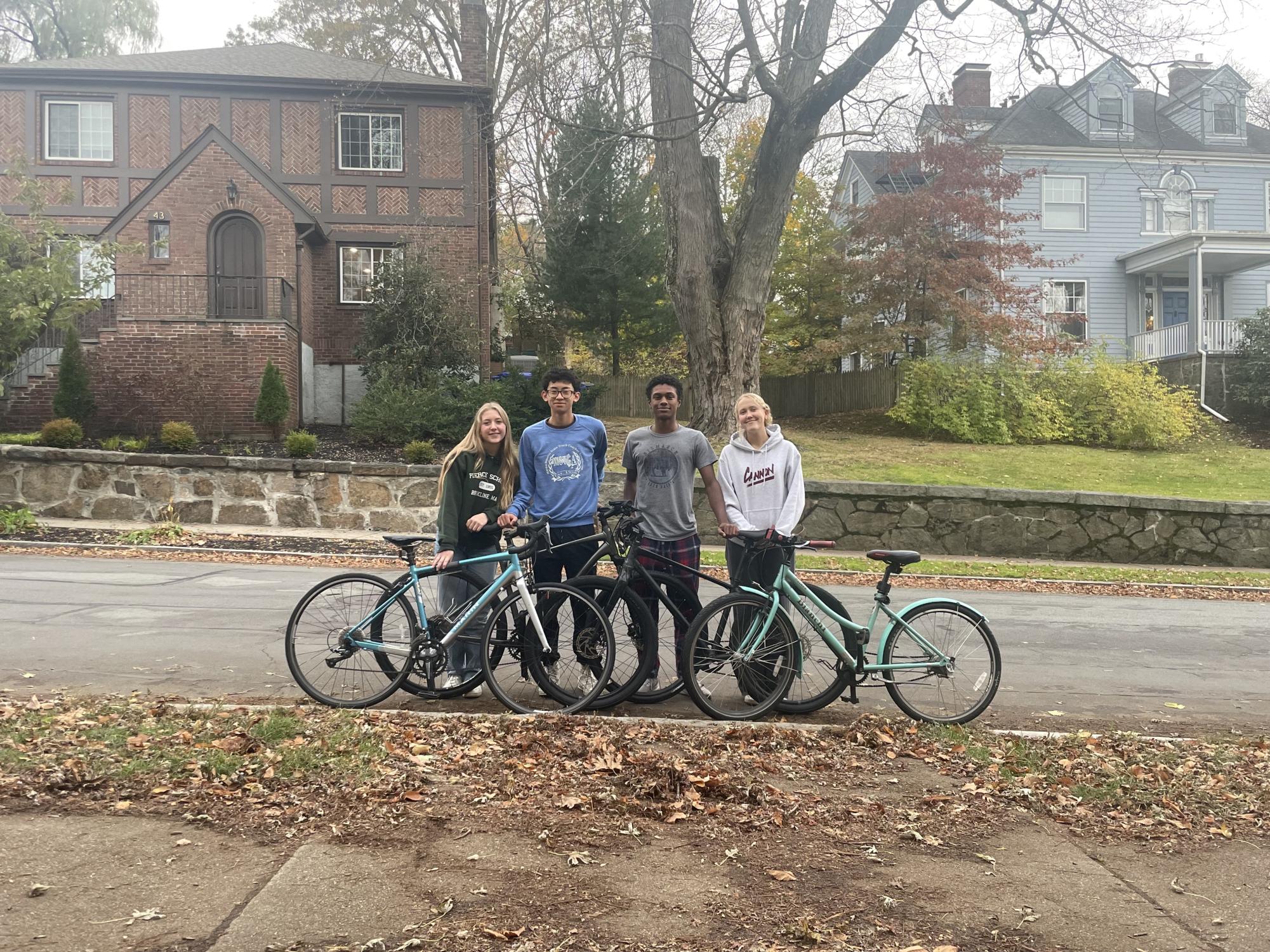 Biking Down Barriers Club founders Antonia Duffield, Lloyd Feng, Ilan Luszczynski-Williams, and Suvi Carlile encourage students to park the car and use a bike.
