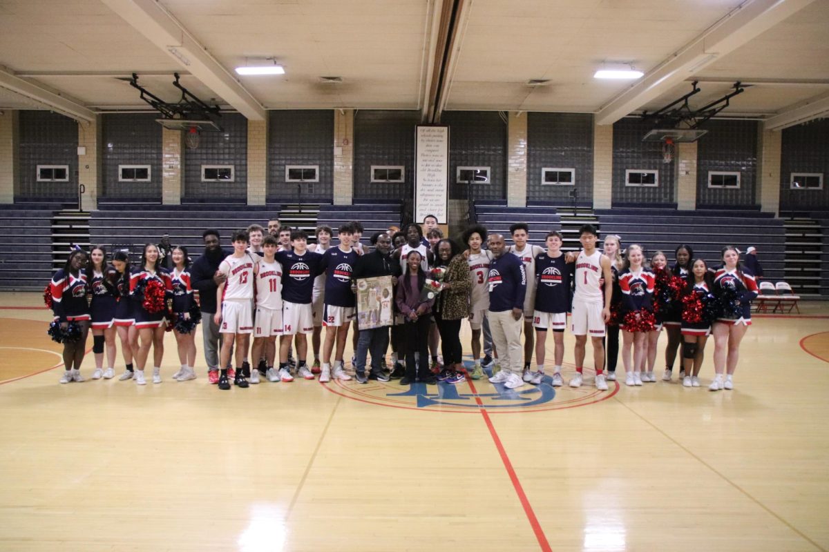 Boys varsity basketball gathered to celebrate graduating seniors on Wednesday, Feb. 14 in the Schluntz Gymnasium. After the celebration the team lost 64-61 against the Charlestown Townies. 