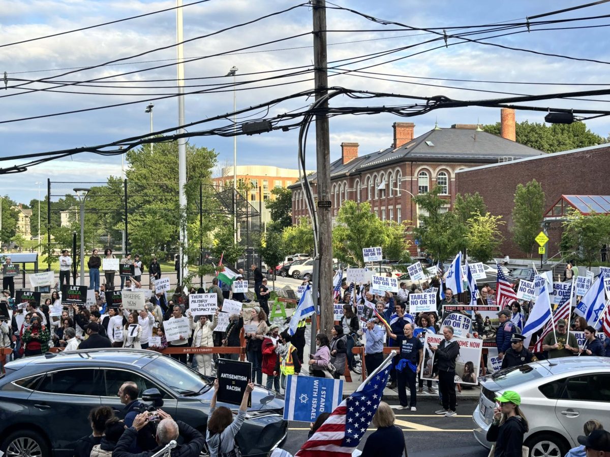 Protesters flooded the sidewalk in front of the Cypress Field to voice their opinions on the controversial Warrant Article 19, a resolution which would call for a ceasefire in the Middle East and a return of all Israeli hostages.