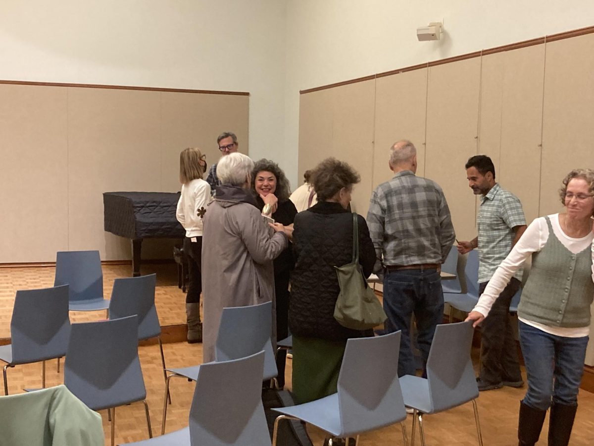 Four poets read four poems in the Brookline library in Brookline Village on Wednesday, Oct. 9. The poems focused on themes of identity and nature. 