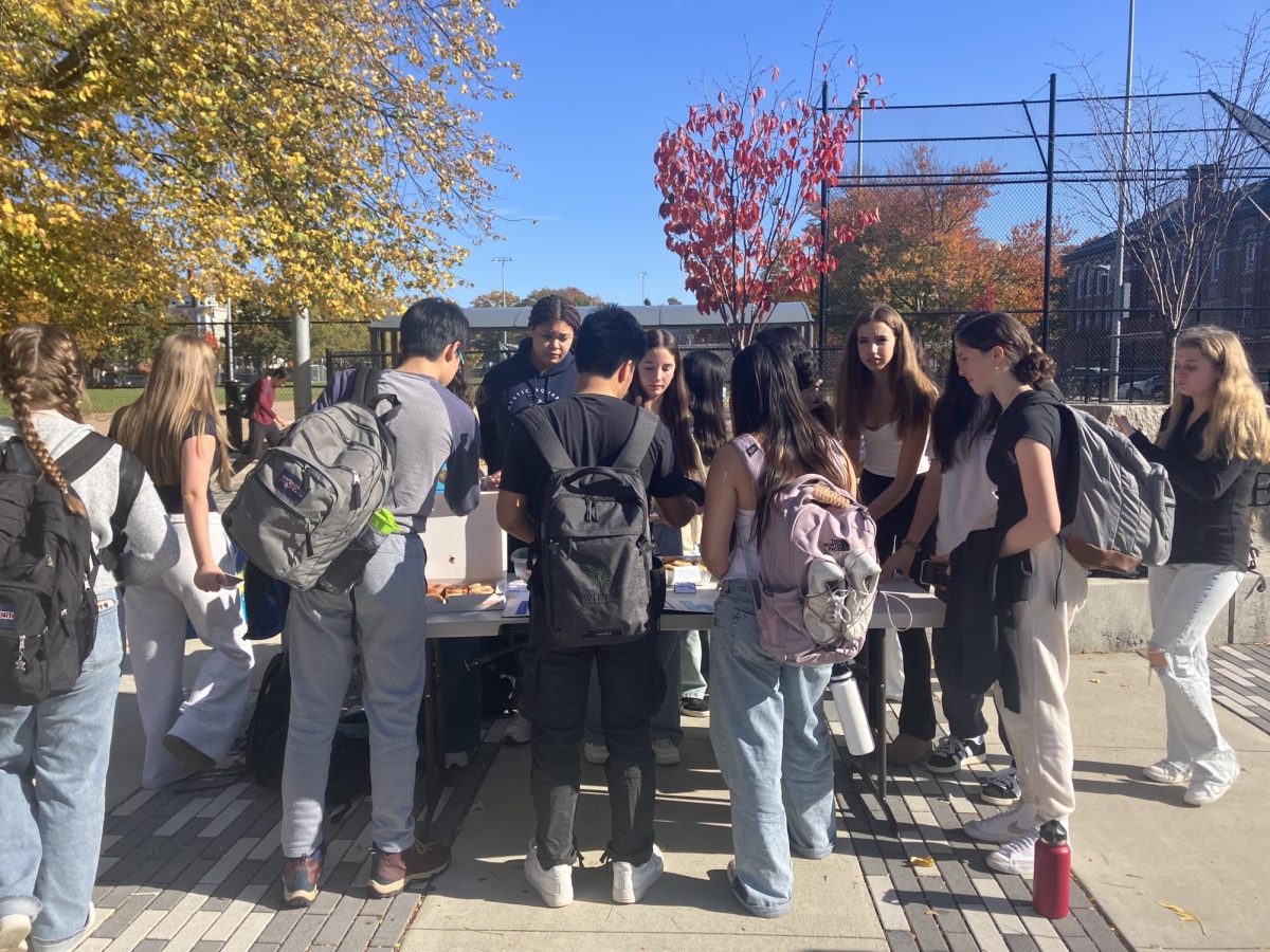 Students gathered around the Make-a -Wish club bake sale outside the STEM wing on Wednesday, Oct. 28.