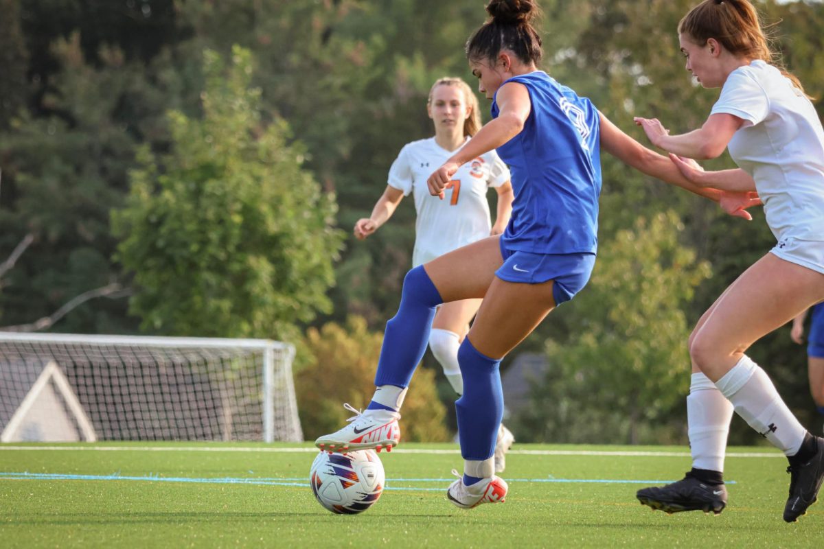 Makena Hammond is a forward on the girls varsity soccer team. Her speed and aggression tend to leave defenders in the dust.