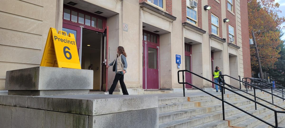 Voters walk into the high school on Tuesday, November 5 to vote in the national election.