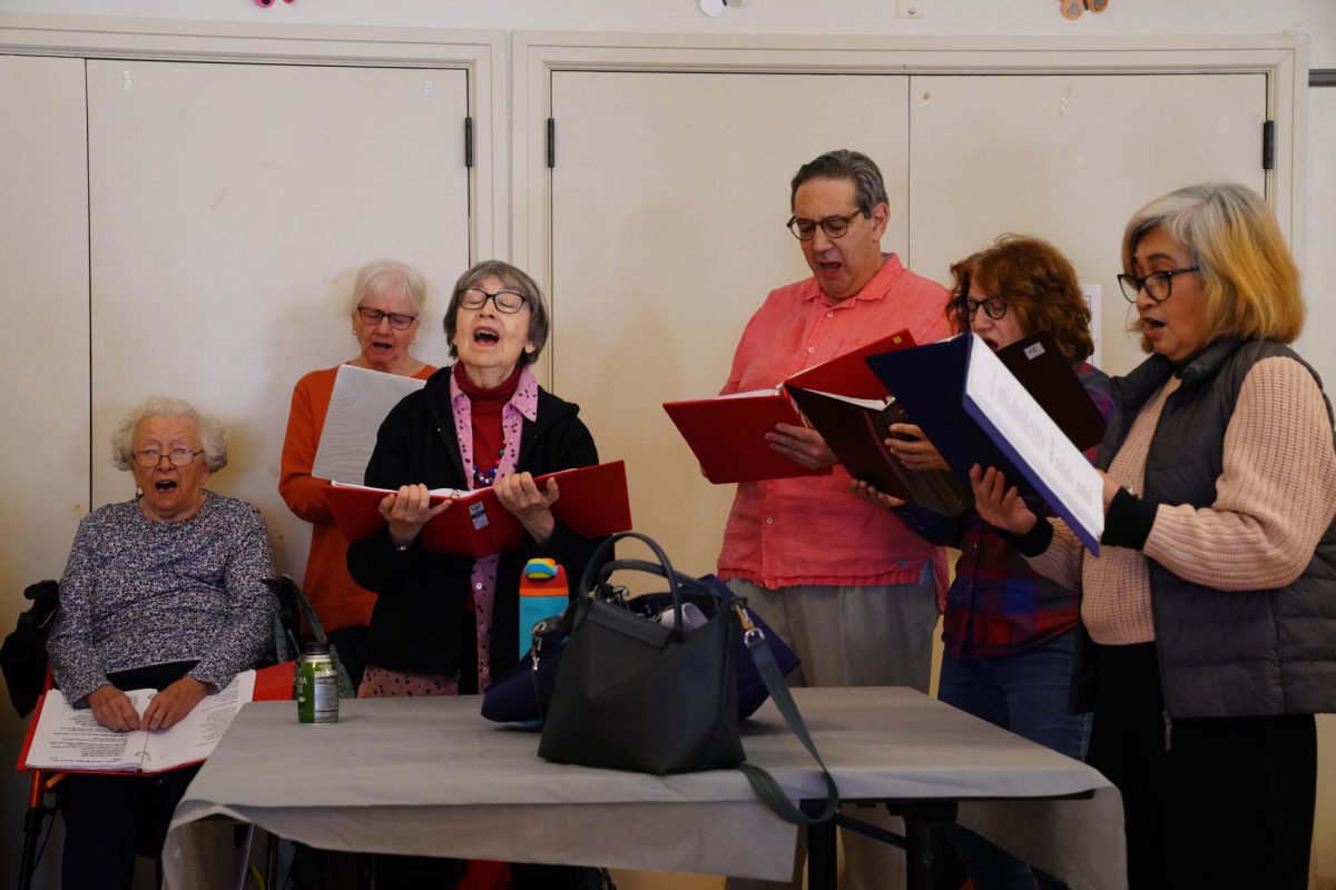 Senior citizens join together in harmony for a heartfelt performance of an American classic, "Imagine" by John Lennon. 