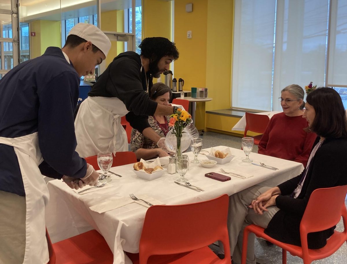 What could be better than celebrating Thanksgiving next week? Celebrating Thanksgiving this week in the company of your teachers and peers, of course! Tappan Green staff hosted a Thanksgiving lunch for the community on Thursday, Nov. 21. The restaurant set up decorated tables for attendees, complete with flower bouquets and bread baskets. Full course Thanksgiving meals were provided, complete with pie, and served by both students and teachers. 