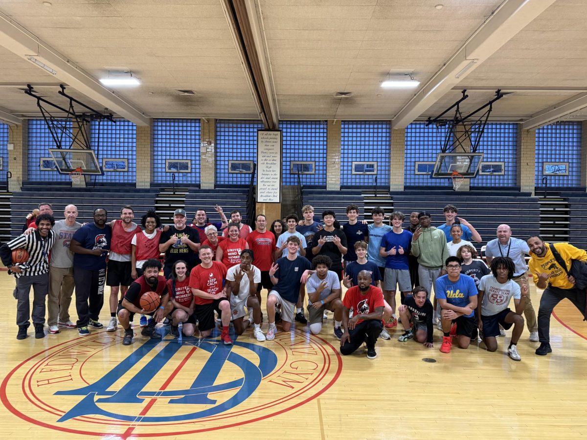 Students and teachers participate in the annual student vs teacher basketball game, with the students emerging victorious on Wednesday, Dec. 12th.