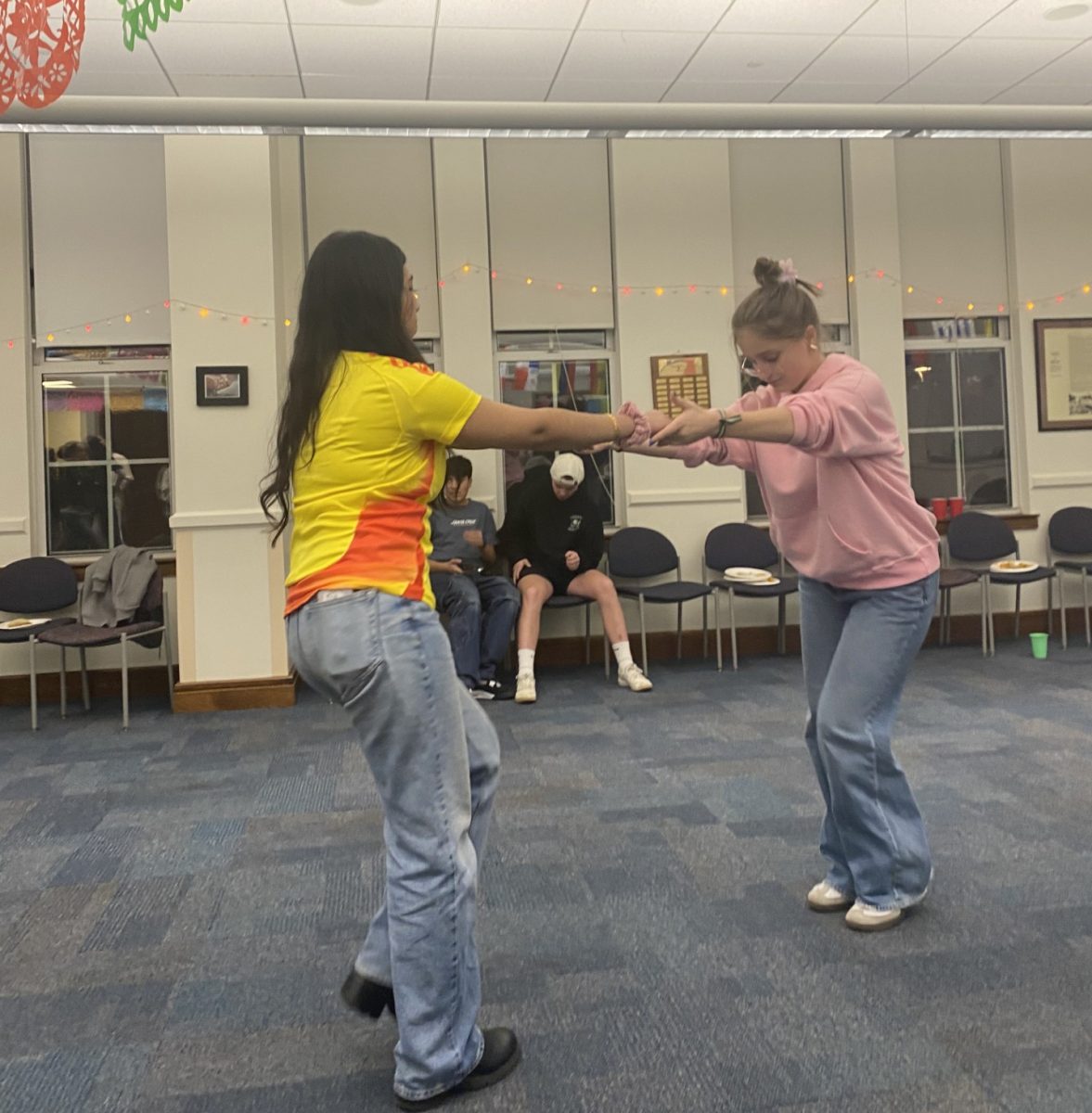 Students danced to music by Latino artists and participated in other activities such as limbo and musical chairs during the Latinx Fiesta held by the Latinx Club in the MLK room on Friday, Dec. 6. 