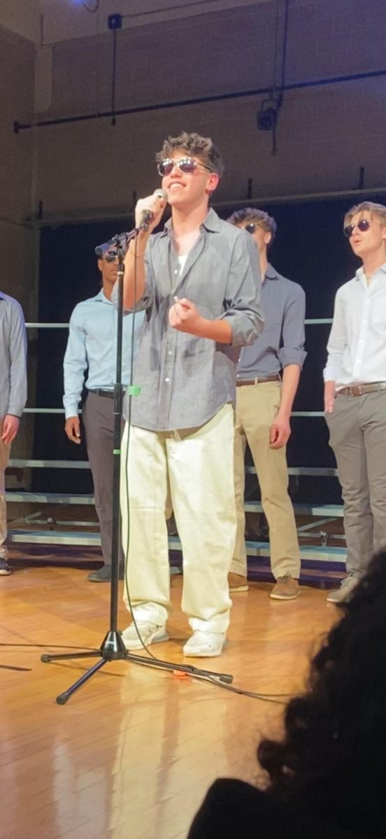 Ian Falck performs with the rest of Bass Value at the high school's 2025 Acappellafest.