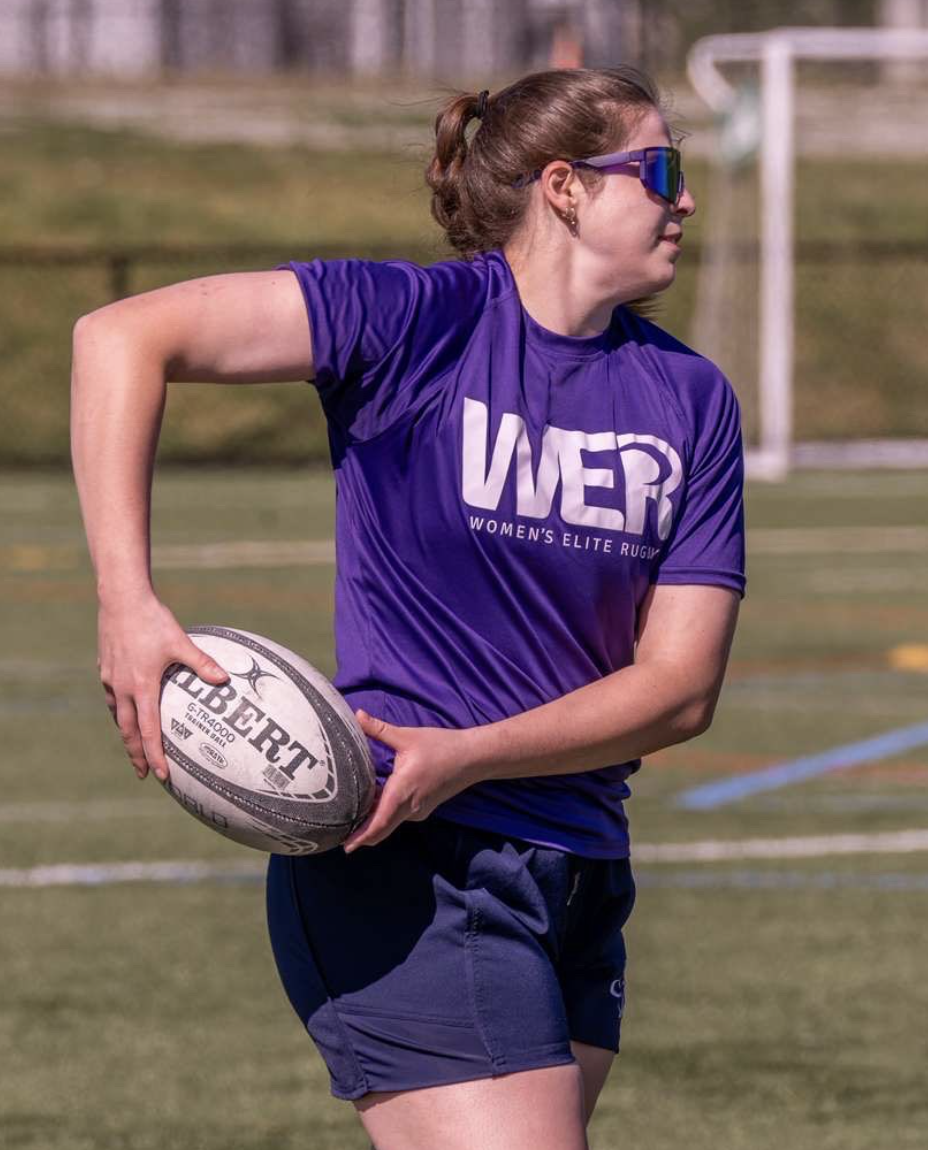 Eliza Altobelli playing for the Banshees, a Women's Elite Rugby(WER) team. Altobelli aims to teach more than just rugby to the girls team.