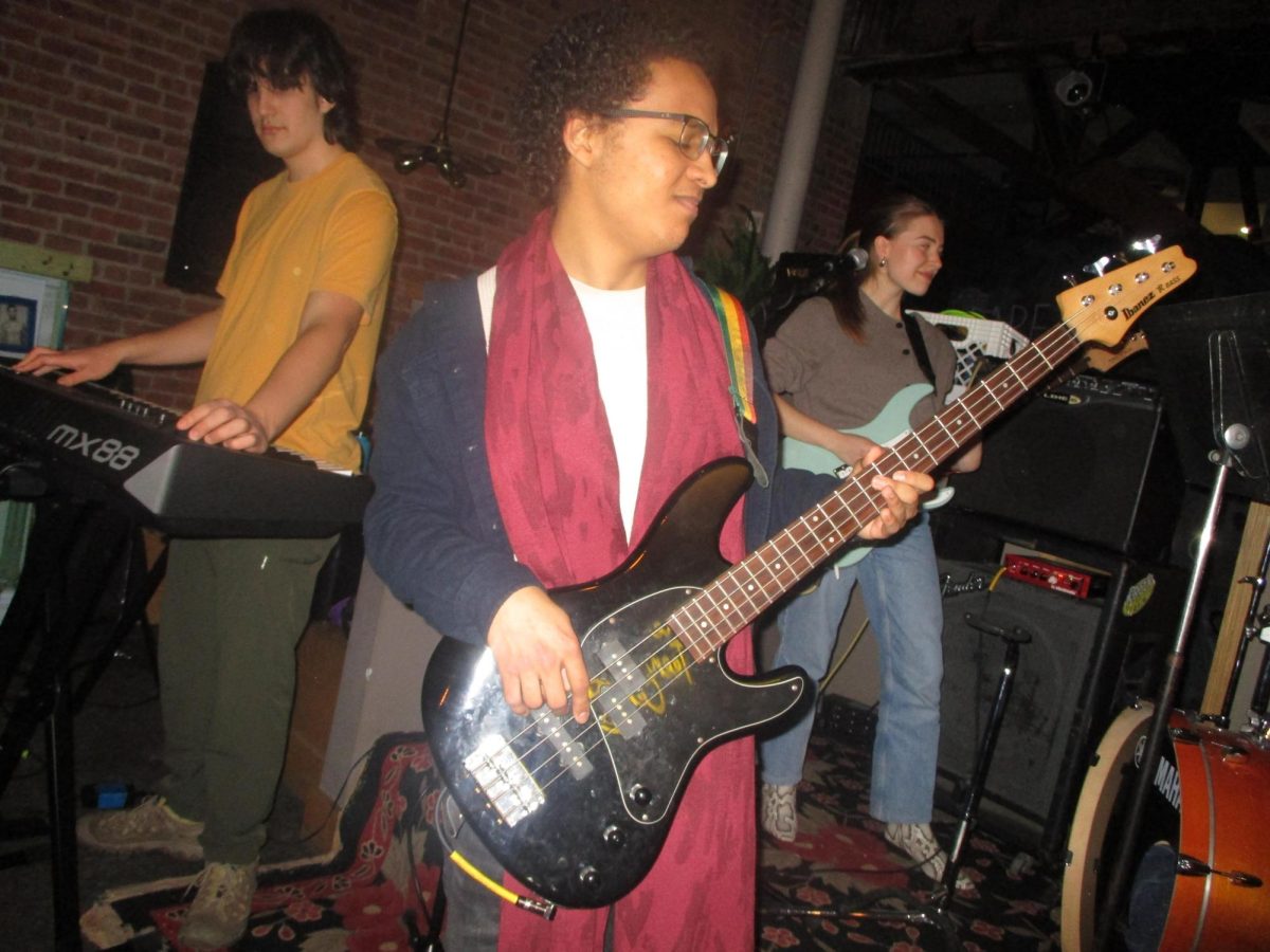 From left: seniors Oscar Mindreau, Faris Majid and Aleksandra Betts, members of the BTC house band, jam out at the BTC's studio.