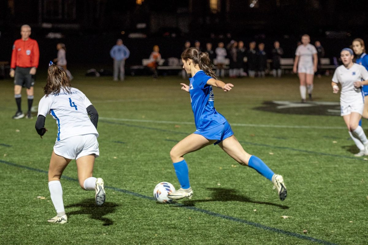 Senior Priscila Hill winds up to pass the ball up the field. She has exemplified the Warrior spirit,
rebounding from a multitude of injuries throughout her athletic career in both soccer and lacrosse.