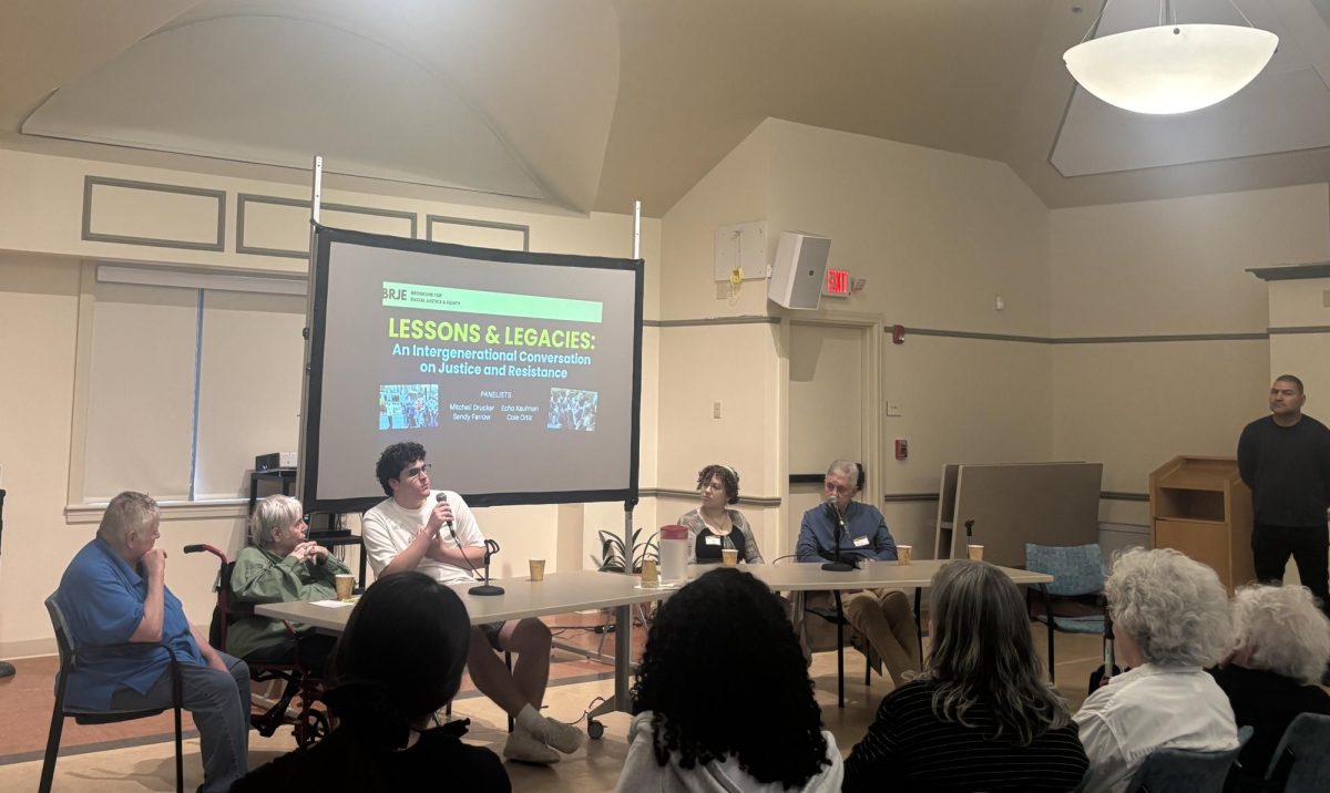 Senior and BRJE Youth Fellow Cole Ortiz speaks at the Lessons and Legacies event on Wednesday, May 6. The event's focus is on intergenerational justice and resistance.