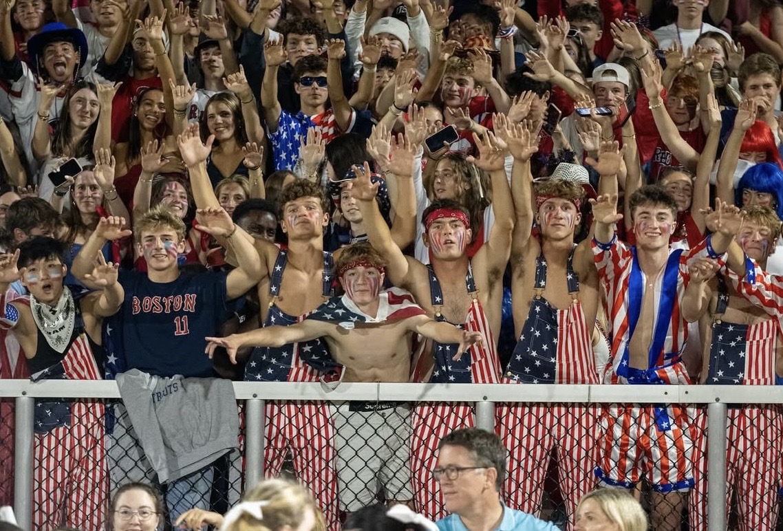 The student section roots for the Warriors during the Sept. 19, 2025 football game versus Newton South.