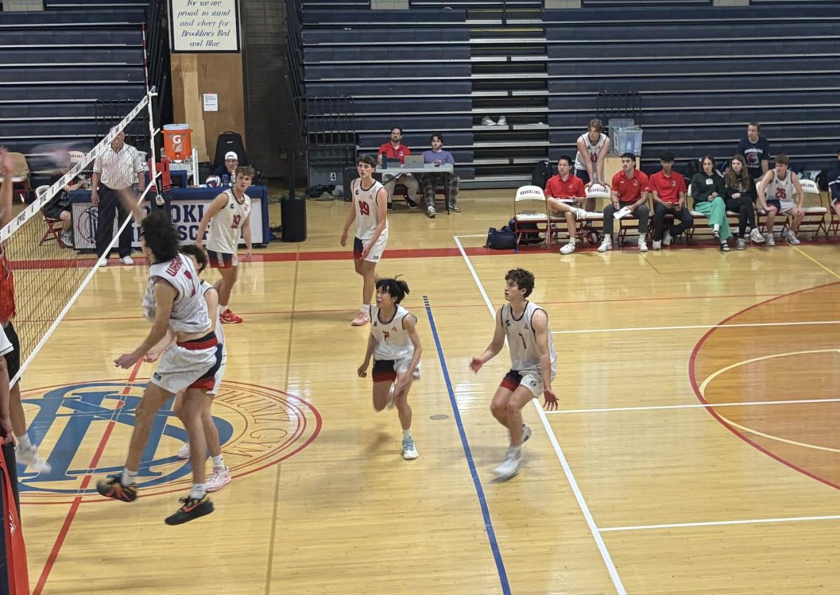 The boys varsity volleyball team dominated at home against the Woburn Tanners on Friday, May 29, winning 3-0 and making their way to the MIAA state tournament round of 16.